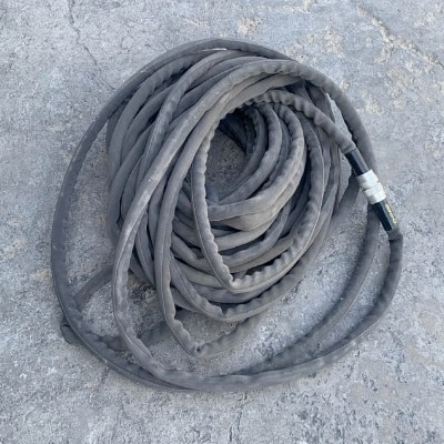 Coiled Up Zero G Hose on Driveway