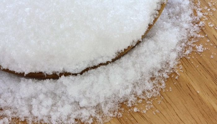 A bowl overflowing with Epsom salts.