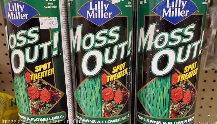 Several cans of Lilly Moss Moss Out! Spot Treater.