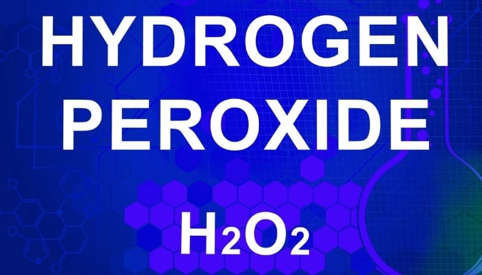 A computer screen with a blue scientific background and the words Hydrogen Peroxide H2O2 on it.