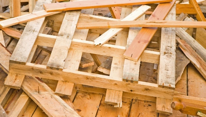 A pile of scrap wood and pallet pieces.